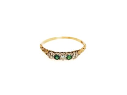 Half-hoop ring with diamonds and emeralds, around 1900